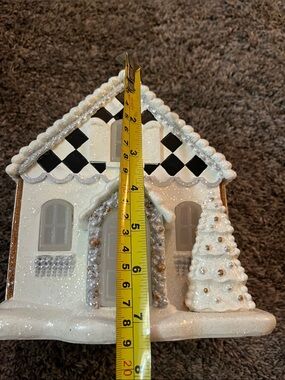 Mackenzie Childs - Illuminated Gingerbread house!  Beautiful decor table/mantle!